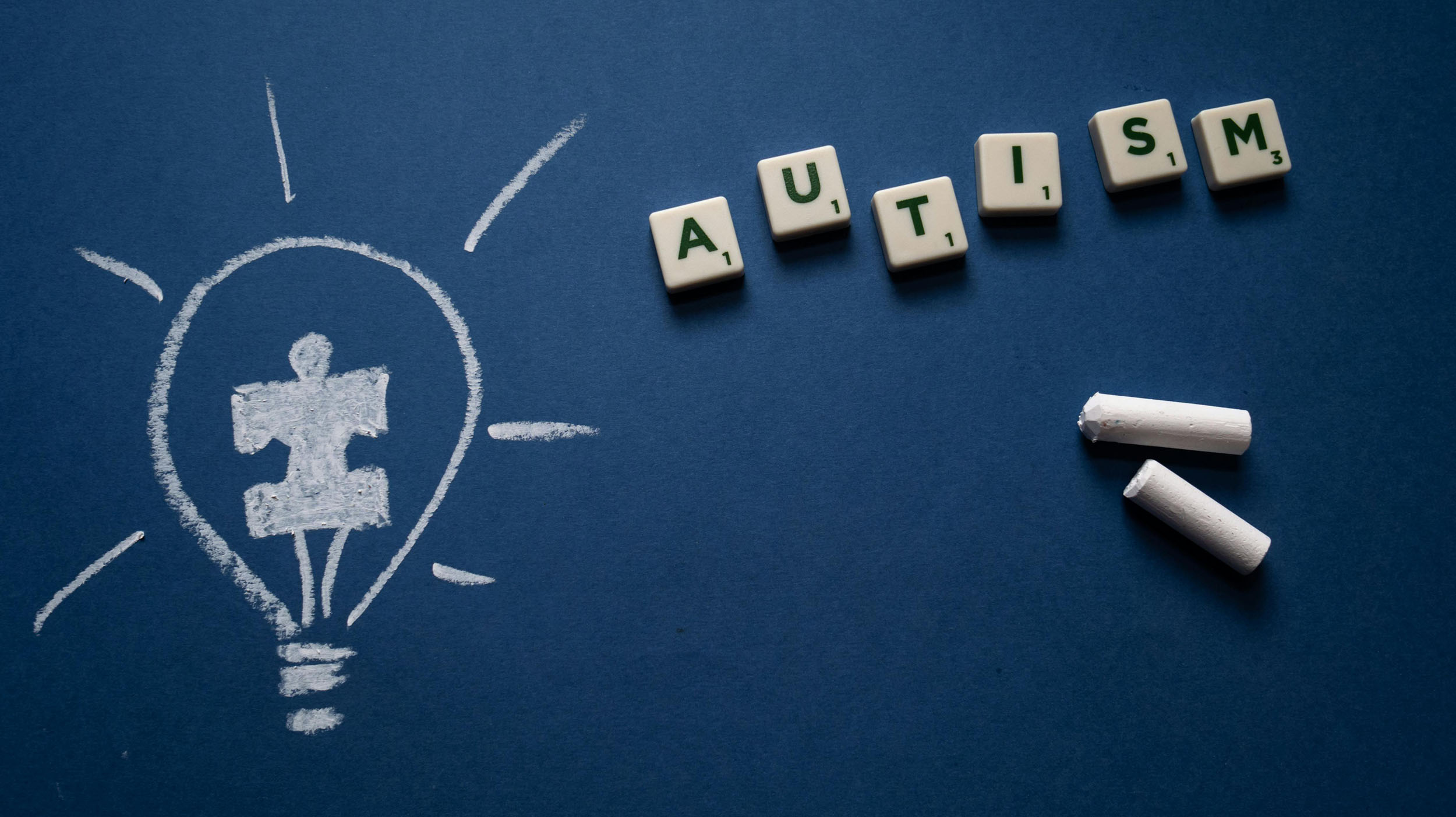 Medical cannabis for autism: A lightbulb and puzzle piece symbolising innovative treatments like medical cannabis for autism spectrum disorder.