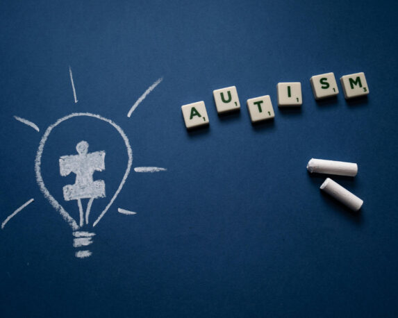 Medical cannabis for autism: A lightbulb and puzzle piece symbolising innovative treatments like medical cannabis for autism spectrum disorder.