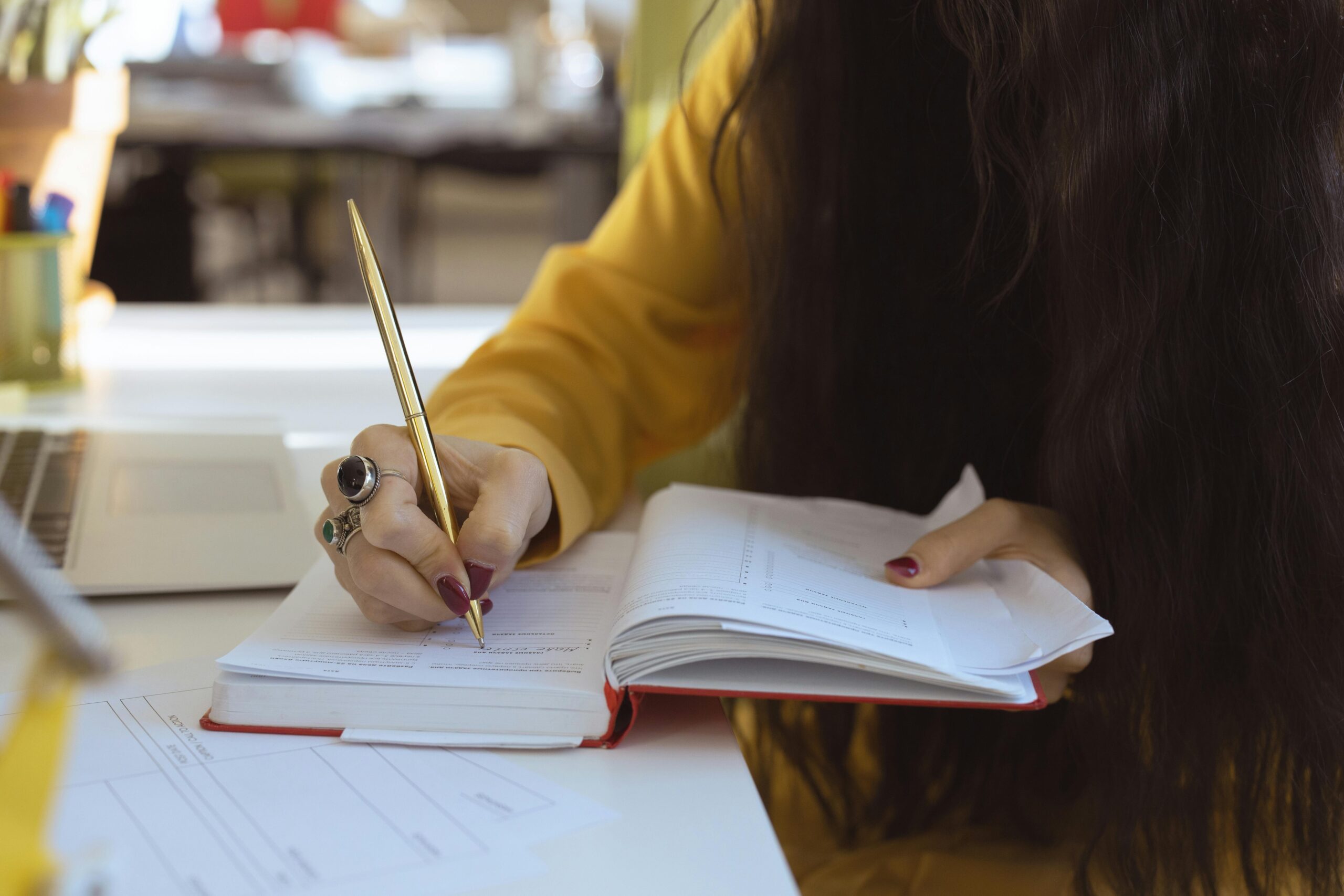 Woman focusing on work after experiencing the benefits of sativa for energy and clarity.