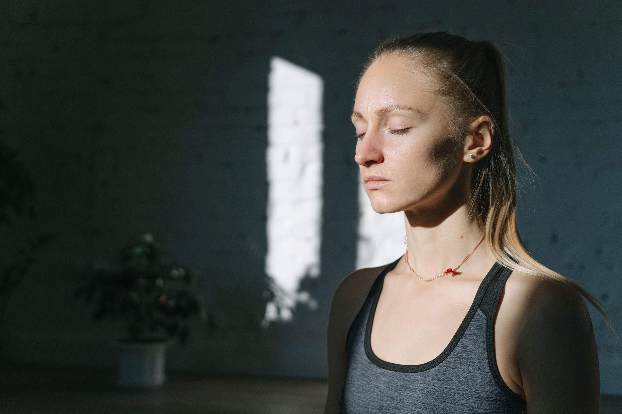 Woman relaxing to calm her nervous system and reduce everyday stress